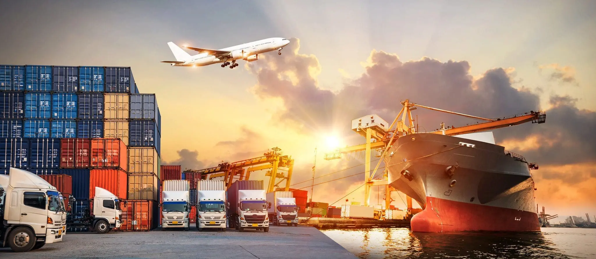 Logistics and transportation of Container Cargo ship and Cargo plane with working crane bridge in shipyard at sunrise, logistic import export and transport industry background